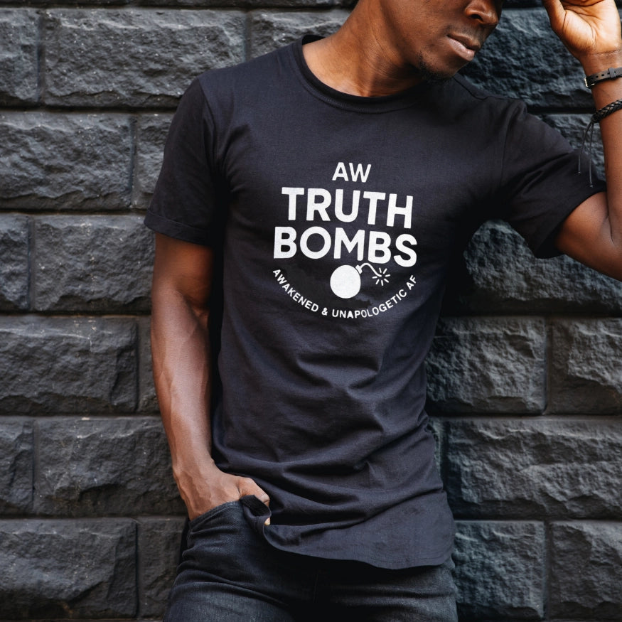 Male model wearing AW Truth bombs awakened and unapologetic AF t-shirt in black.