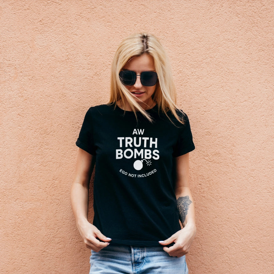 Woman wearing a black t-shirt, AW Truth bombs ego not included